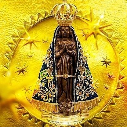 Com a mãe aparecida